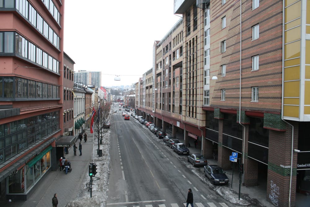 Grønland street in Oslo with people, shops and signs, reflecting the city’s most multicultural neighborhood