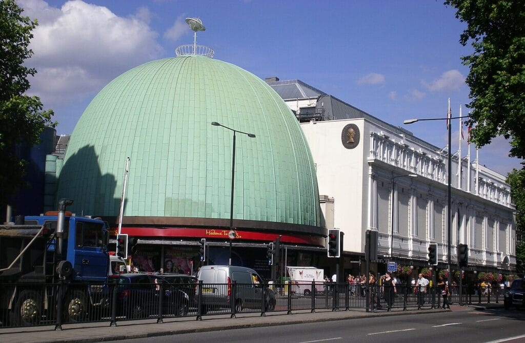 Madame Tussauds London entrance on a busy day, showing flat pavement and step-free entry for wheelchair users