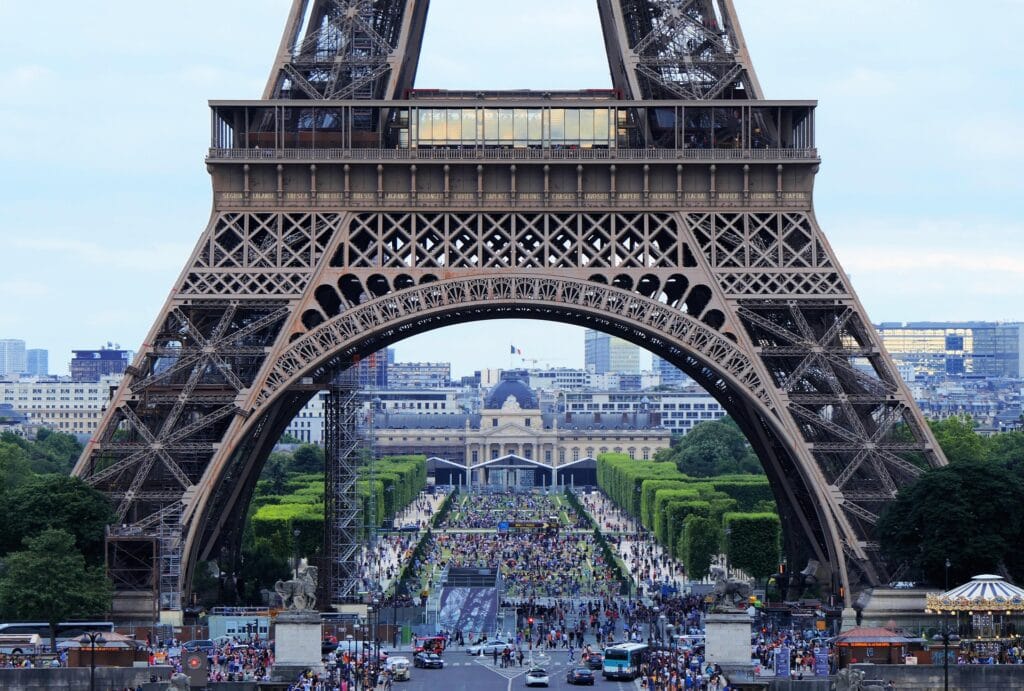 Eiffel Tower with accessible elevator entrance marked, showing second floor accessible level with panoramic Paris views, disabled traveler access point visible