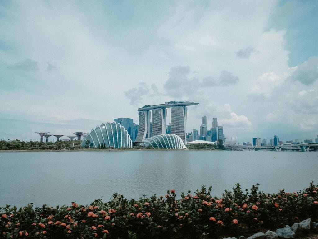 Singapore's Marina Bay skyline with Gardens by the Bay illuminated at night, representing Singapore's modern and safe solo travel hub