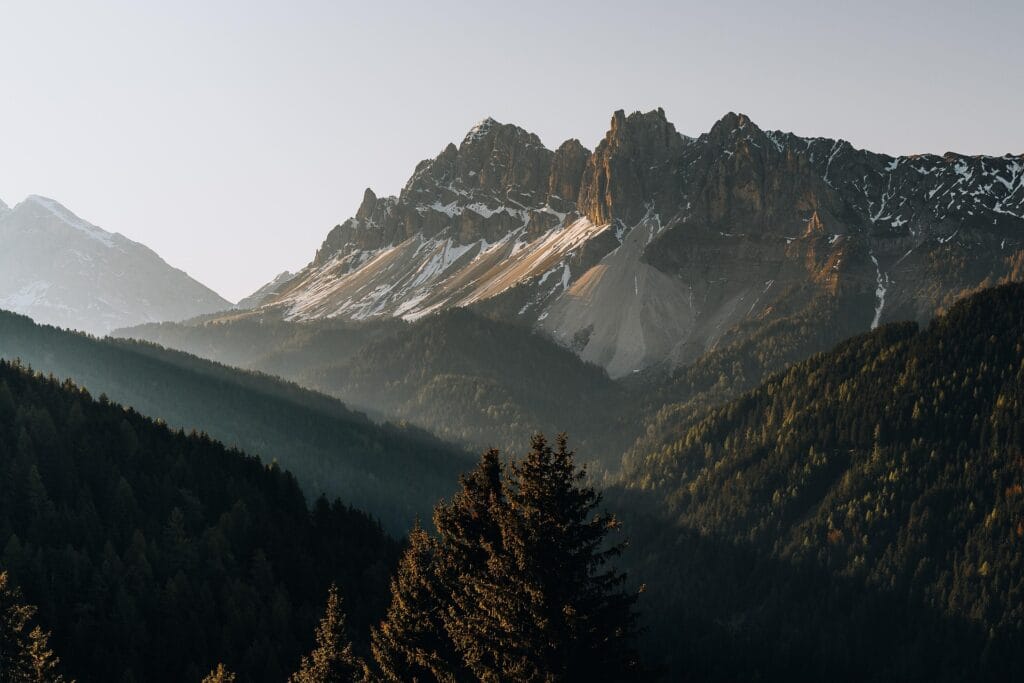 Tre Cime di Lavaredo three towering cliff formations with alpine meadow wildflowers, Dolomites summer hiking destination