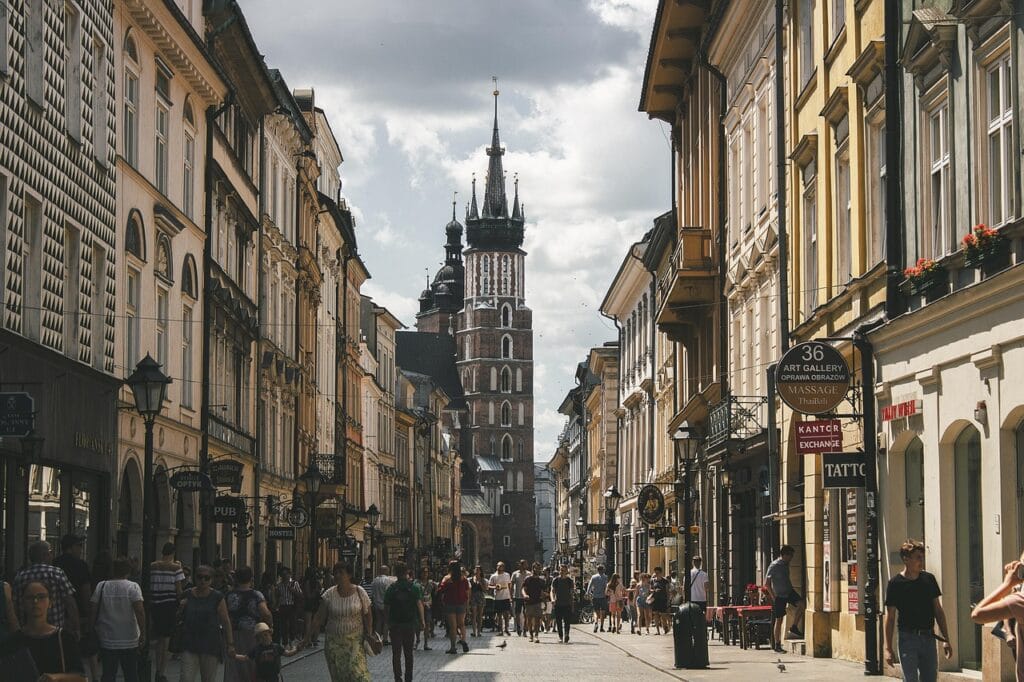 Krakow Poland historic town square with medieval tower buildings, Eastern Europe's cheapest culture destination
