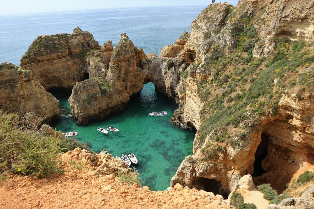 Dramatic golden cliffs and rock formations at Ponta da Piedade in the Algarve region of Portugal.
