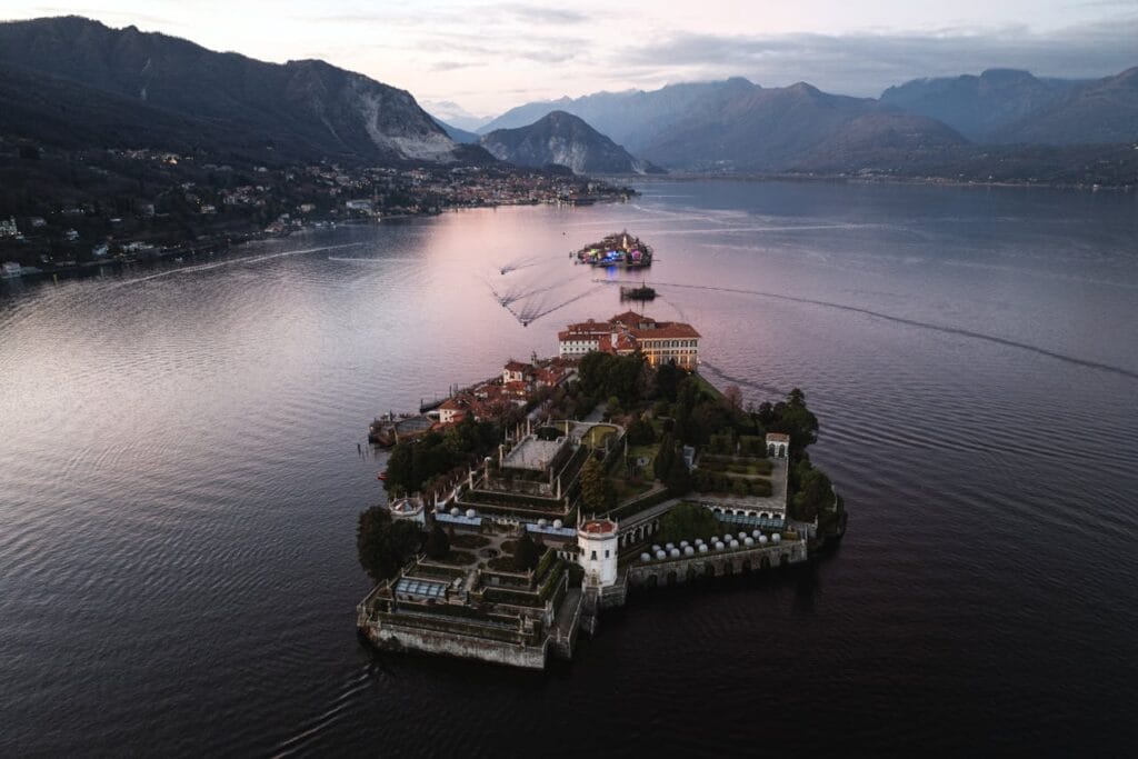 Aerial view of Isola Bella and its gardens on Lake Maggiore, Italy, at sunset.