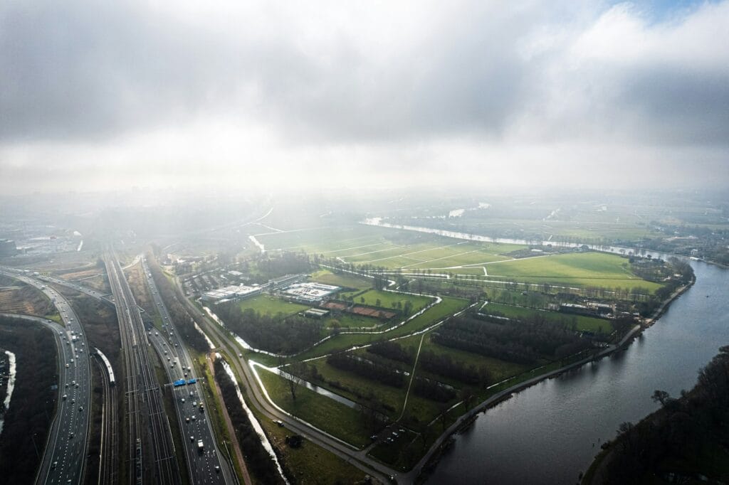 Highway and river view near Amsterdam, illustrating accessible road travel and driving access