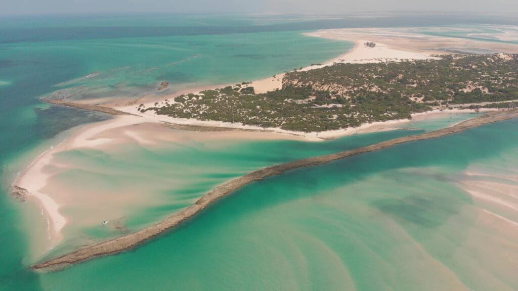 Aerial view of the coastline and Bazaruto Archipelago in Vilanculos, Mozambique, an underrated Indian Ocean destination.